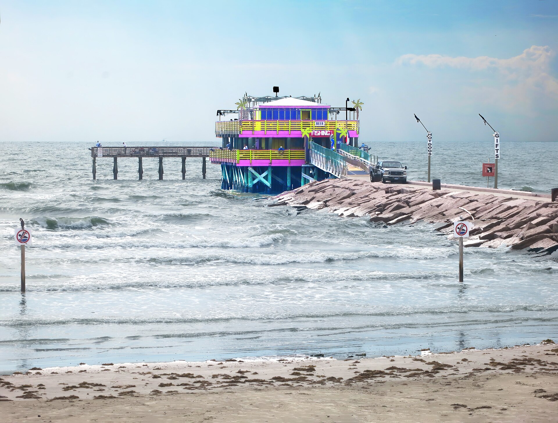 Anglers and bait house on Galveston 61st Street Fishing Pier, Texas